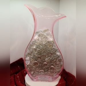 Pink vintage curvy vase - Flaired diagonal brim & flat sides.